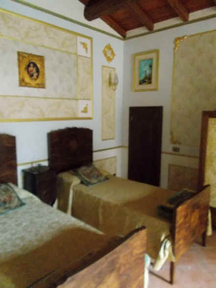 Camera da letto allievi Domenico Gizzi nella Casa Palaziata